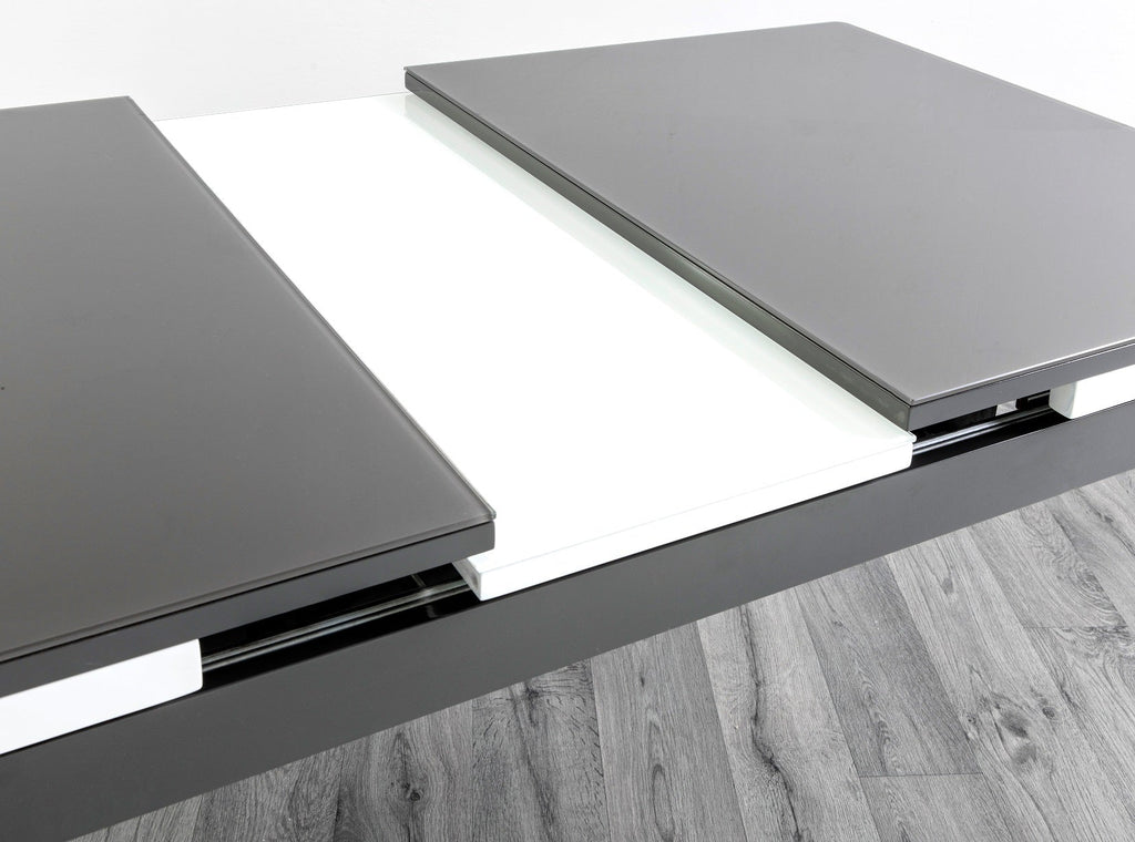 HUSTY GLASS DINING TABLE